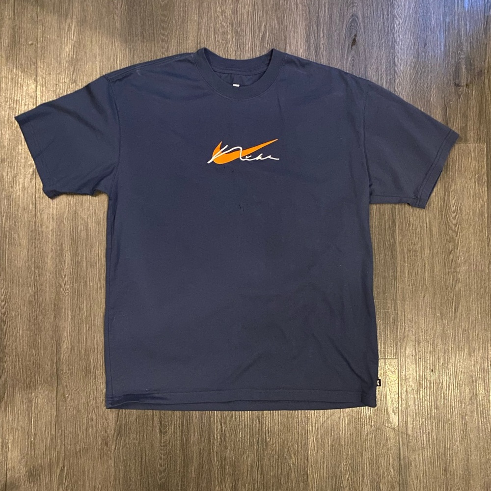 Nike Men's Dark Blue Tee with Orange Logo